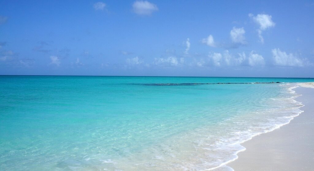 Powdery white sand and crystal-clear water at Grace Bay Beach in Turks and Caico